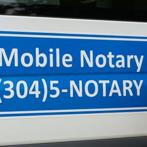 Teenage Daughter With Peace Sign Standing Beside Truck With "Mobile Notary" (304)5-NOTARY Magnet On The Door